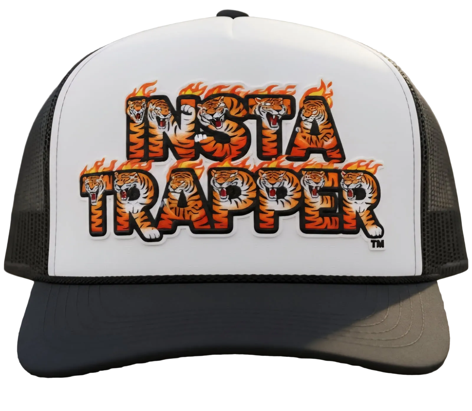 A black and white trucker hat featuring a white front panel with the text 'INSTA TRAPPER' in bold black letters filled with orange and yellow tiger illustrations and flames. The brim and mesh back are black.
